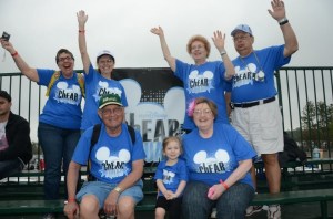 Ok, this isn't the photo of them cheering for me, but this is the bleachers they were sitting in.  They are the 2 sitting down.  Photo courtesy of runDisney