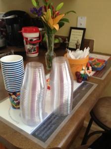 Cups, plates and napkins were included in the kit. I also used a flower pot I bought at World of Disney last year for the utensils. I took it on my DCL Dream cruise last year and had the characters sign it.