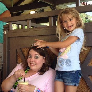 Hailey tried to get my tiara at the Dole Whip meet up.