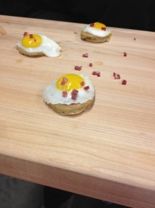 Buckwheat pancake with sunny side up quail egg and salami