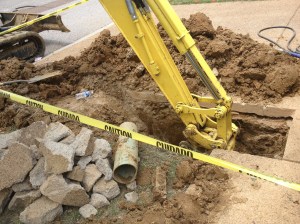 A big hole in my yard and driveway.  Sadness!