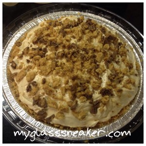 Finally, more Nutter Butters and Reese's Peanut Butter Cup Miniatures get chopped up to garnish the pie.