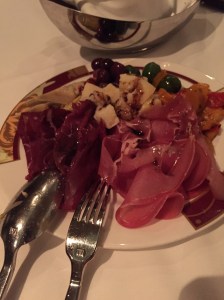 The waiter placed a generous amount of each item on a plate for us to share.